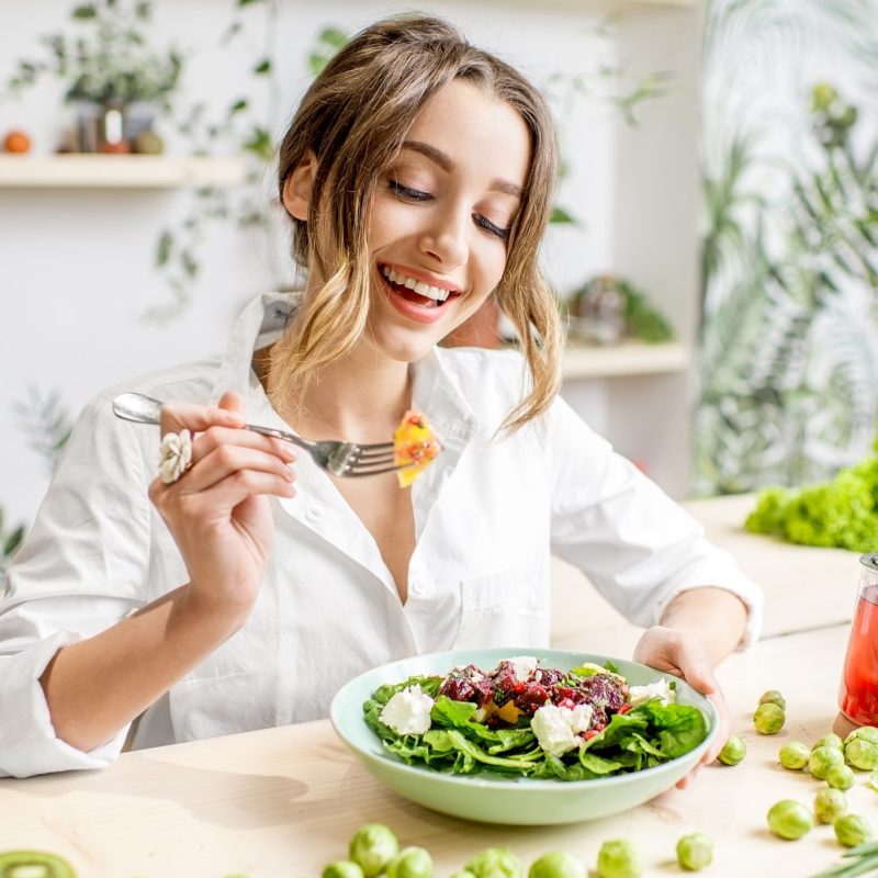 woman-with-healthy-green-food-2021-12-23-15-39-13-utc-min.jpg