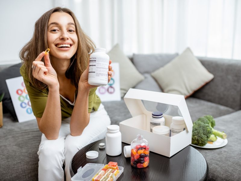 woman-with-nutritional-supplements-at-home.jpg